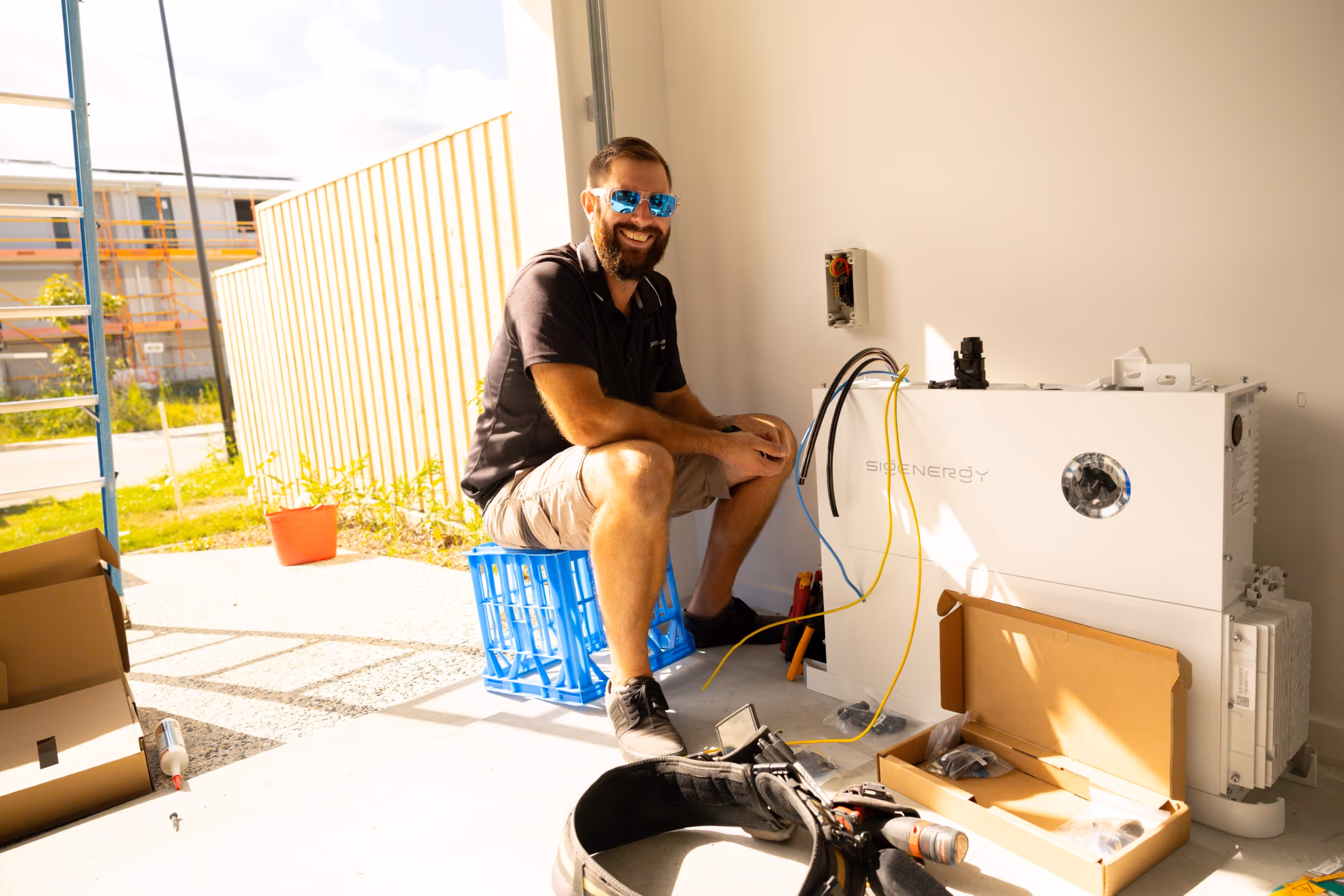 Professional residential solar battery storage system installed in a Brisbane garage by an LMS Electrical in-house electrician, providing energy independence for a Queensland home.