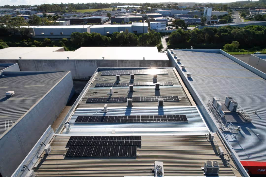 Commercial solar panel system installed on a business rooftop in South East Queensland by LMS Electrical.