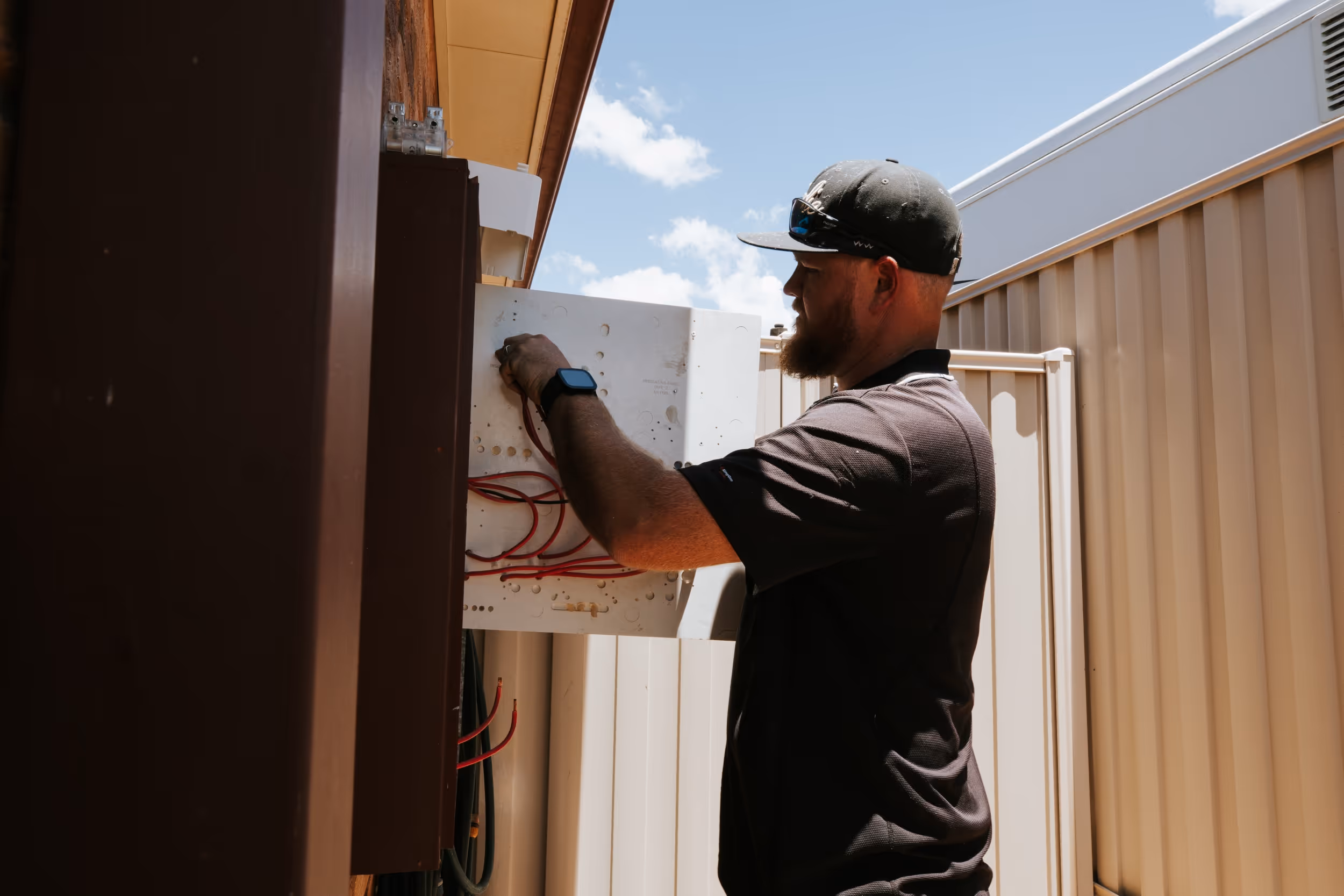 LMS Electrical in-house electrician performing solar monitoring system optimisation in Brisbane.