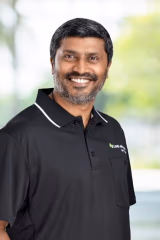 A professional headshot of Sri Nair, LMS Electrical IT support.