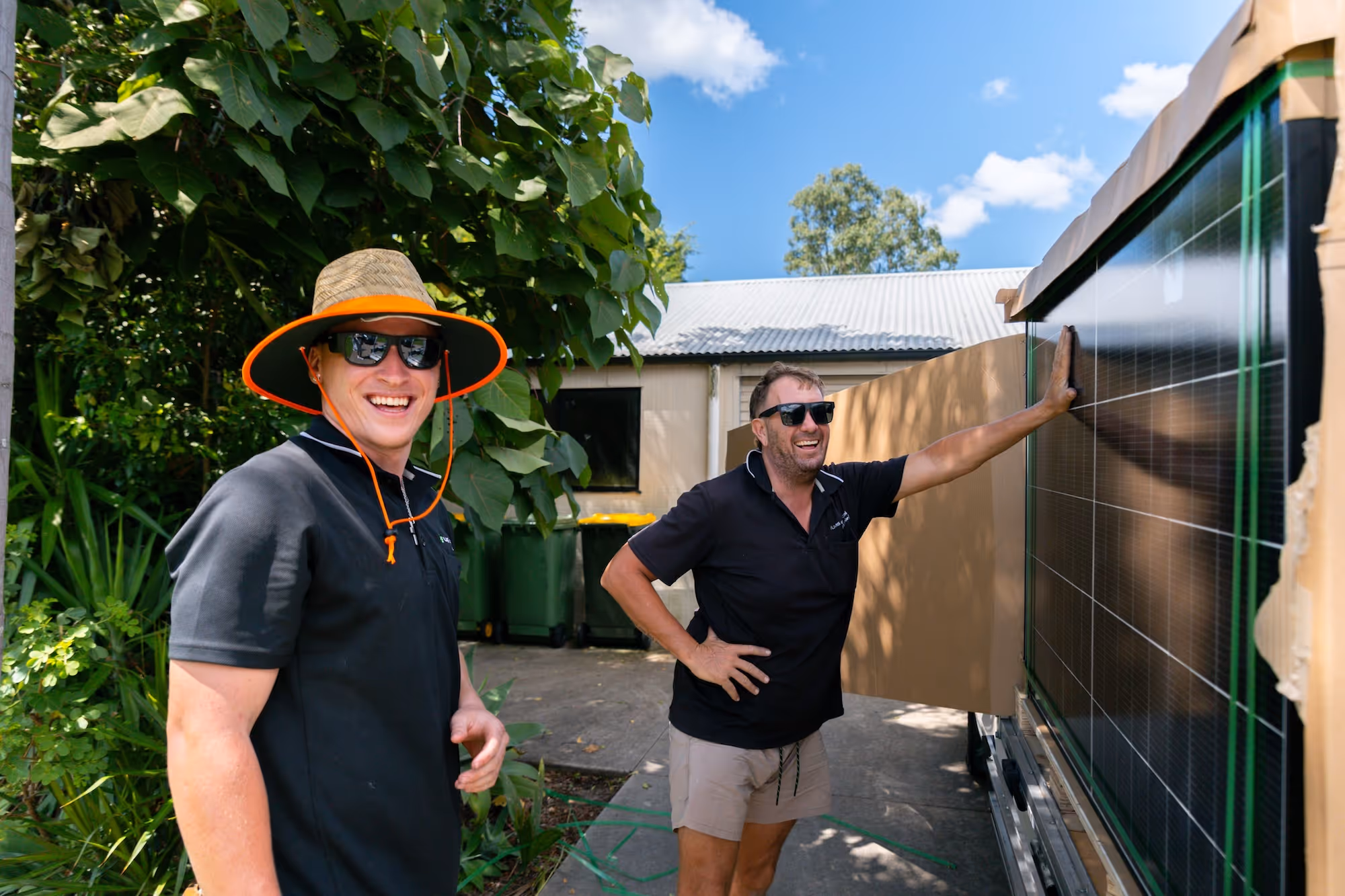 Friendly LMS Electrical team members smiling and laughing onsite.